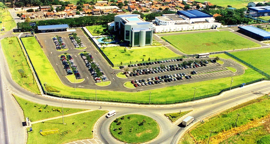 an aerial s of a large building and parking lot