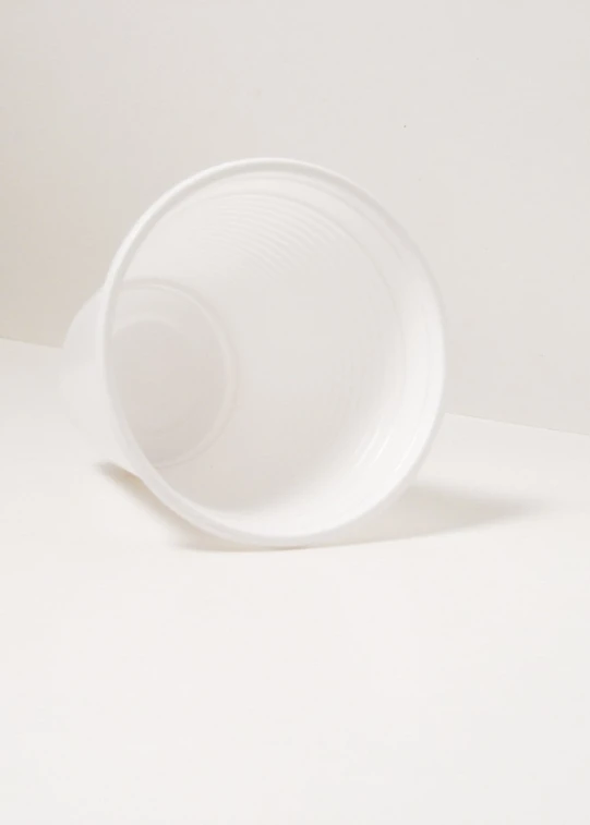 a empty bowl on a white table
