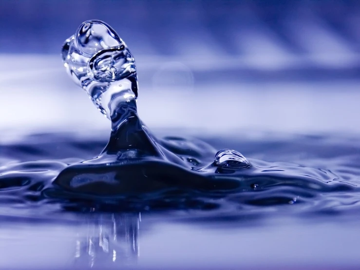 water running through the air in a blue liquid