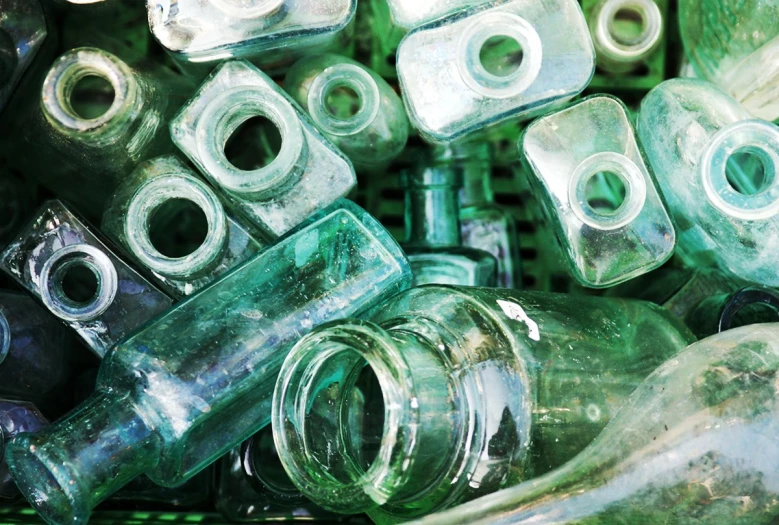 a number of bottles near one another near one another