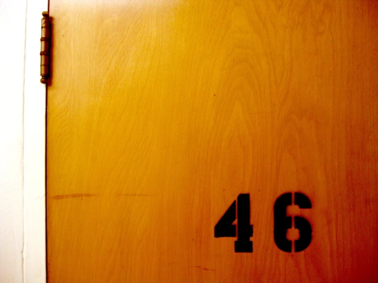 a door with the number 46 etched into it