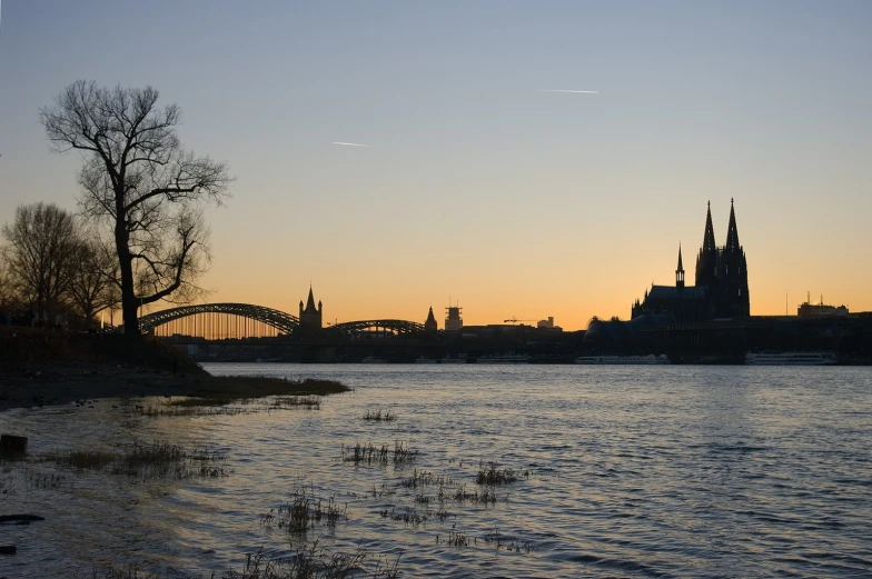 a large cathedral stands out over the water