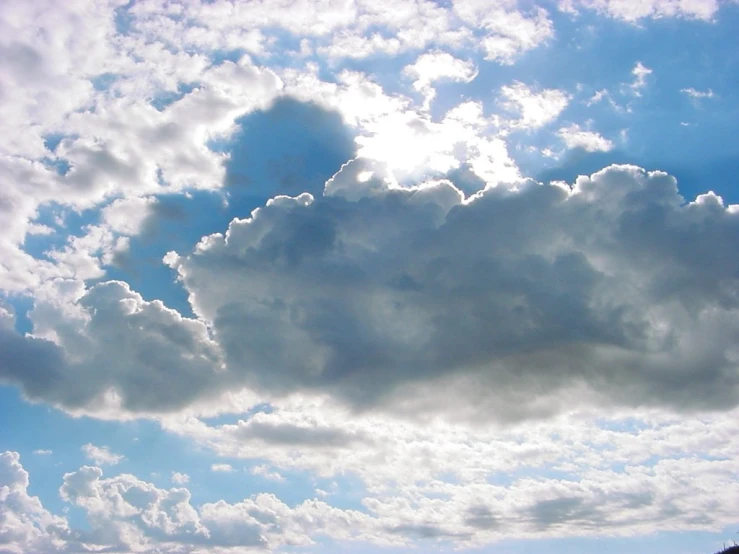 an upward view of a cloud in the sky