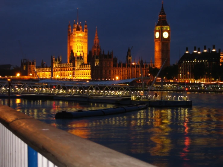 a beautiful evening view of the big ben clock tower towering over the london skyline