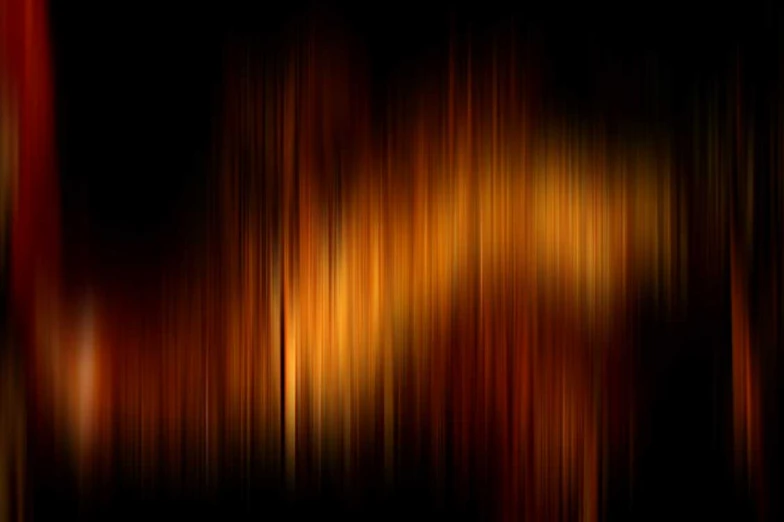 an abstract image of red and yellow lights