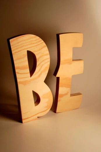 the wooden alphabet is standing upright with its letters in front