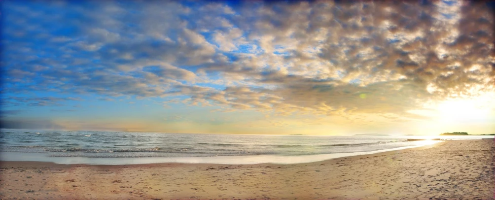 the ocean is empty with footprints all around