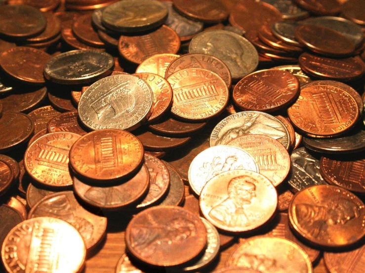 a pile of penny coins are shown in this image