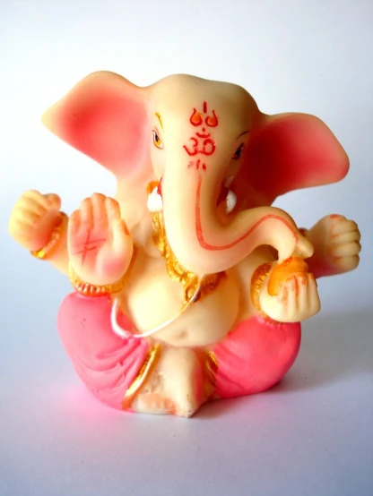 there is a figurine of an elephant with a ring