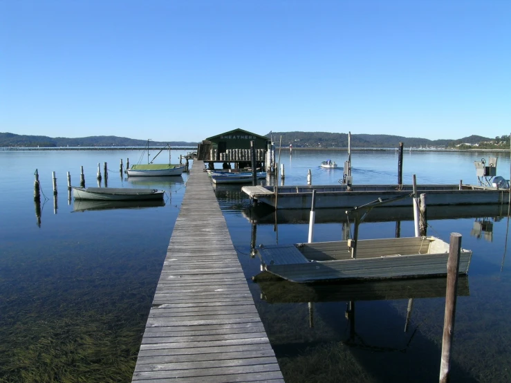 there are many boats parked in the water