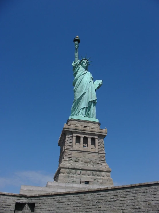 the statue of liberty is seen in this po