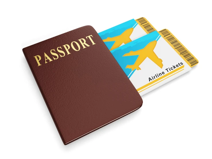 a book and a passport are seen side by side