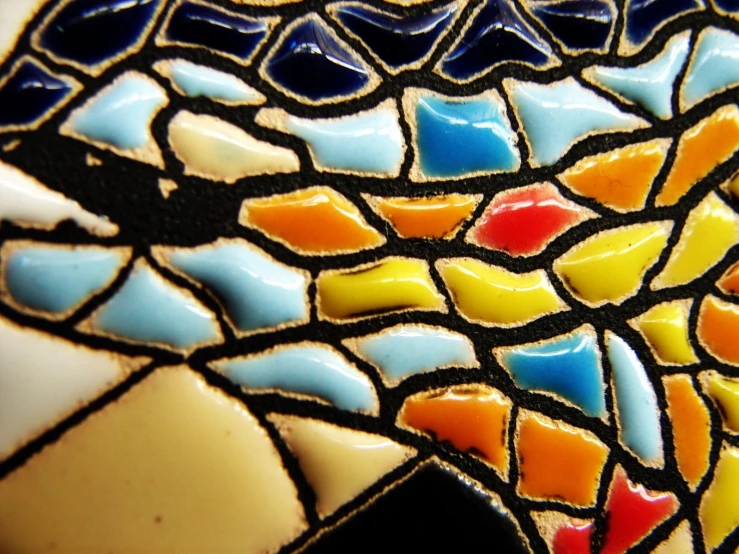 a colorful tile design is on display in the store