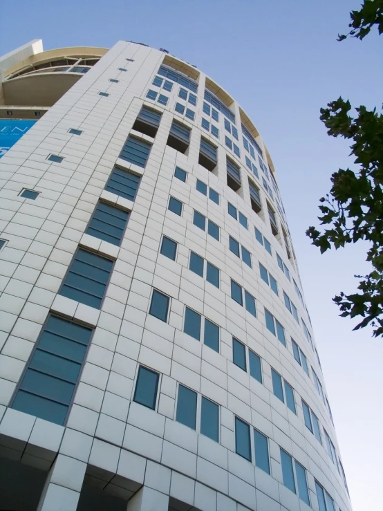 the top of an office building with several windows