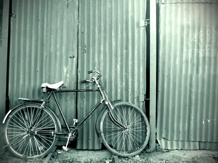 a black and white po of a bike outside a building