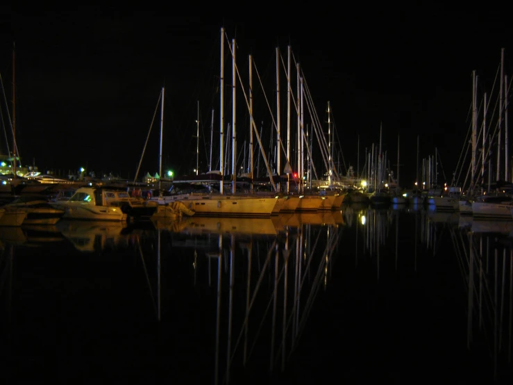 a harbor with some boats sitting parked in it