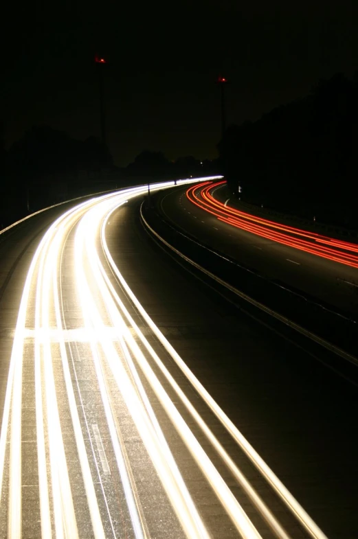 the image is a long exposure of light streaks