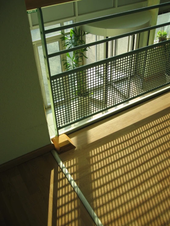 an aerial view of the top of a balcony in the sun