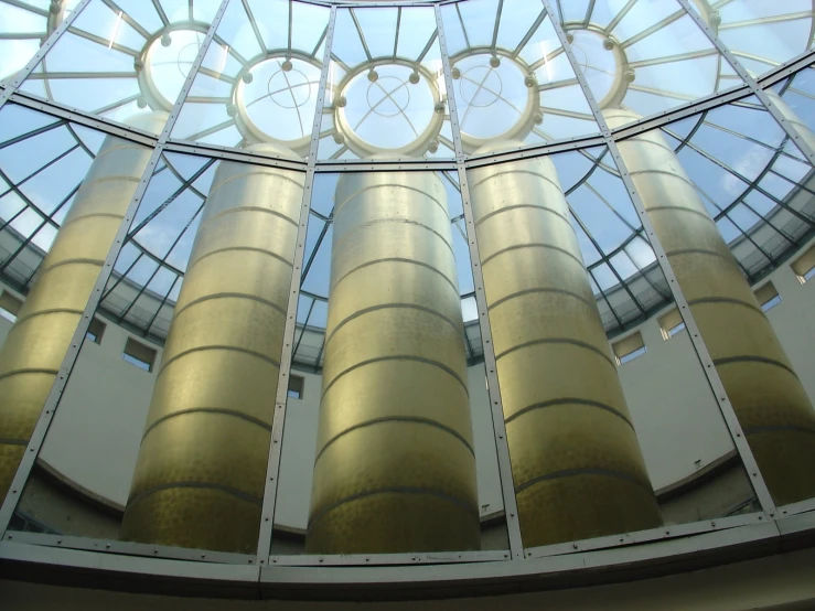 some large mirrors on the ceiling in an ornate building