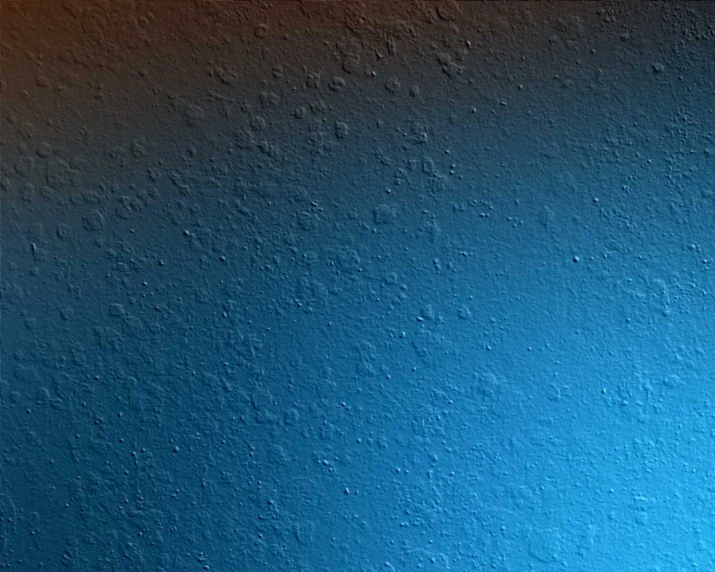 a blue wall painted with white paint