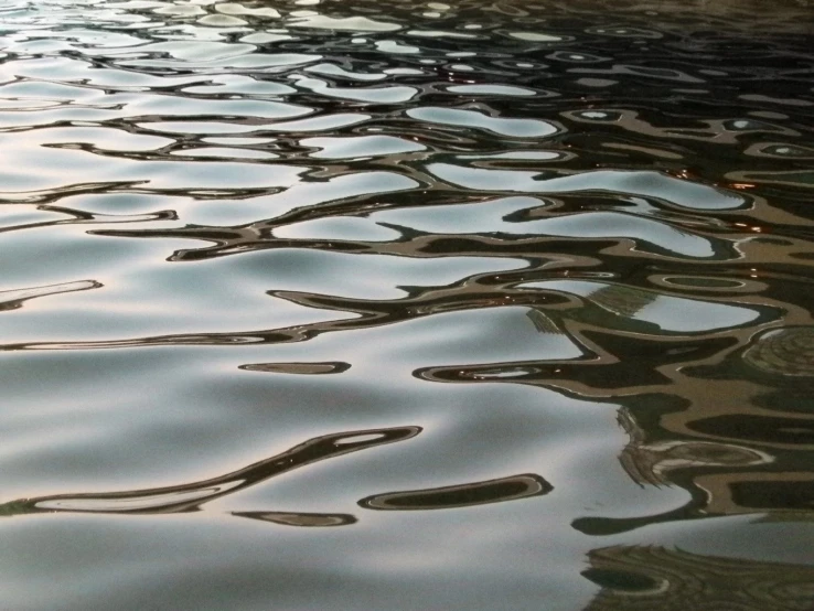 many different types of distorted shapes in the water