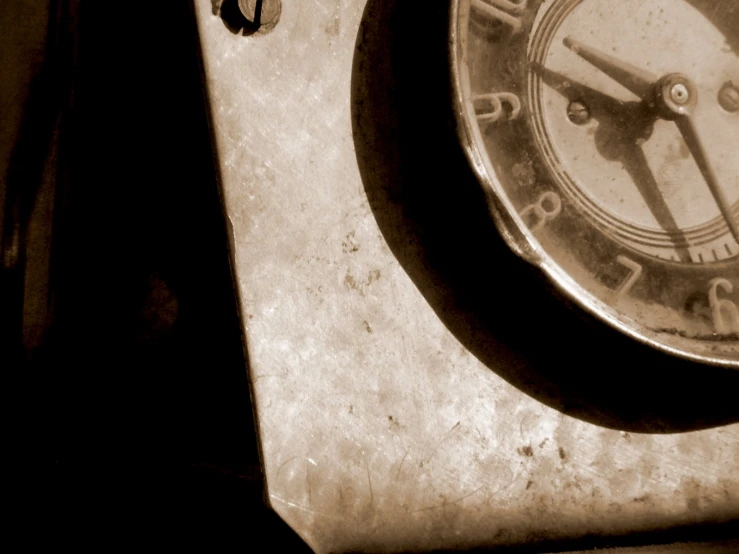 an analog clock on a wall with its hands showing