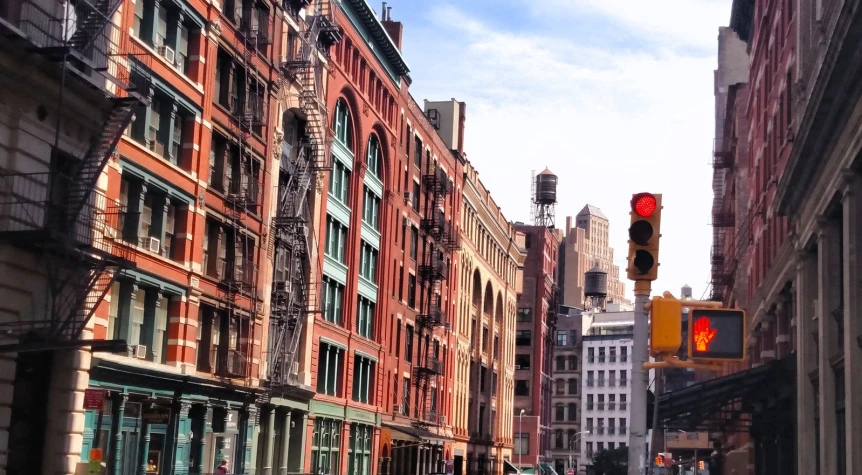 a street in the city during a sunny day