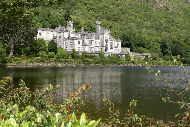 the white building is located on top of the hill