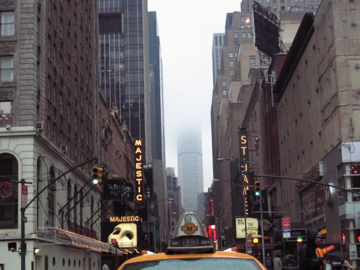 the taxi cab is making its way through the city streets