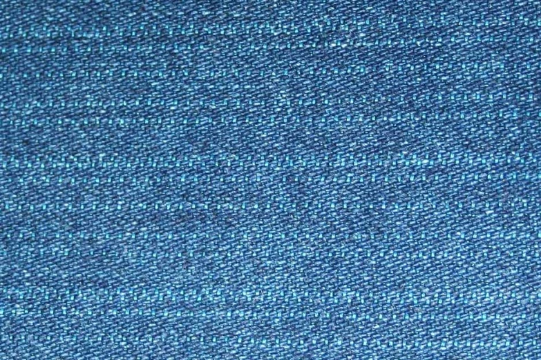 a close up of a blue jeans fabric