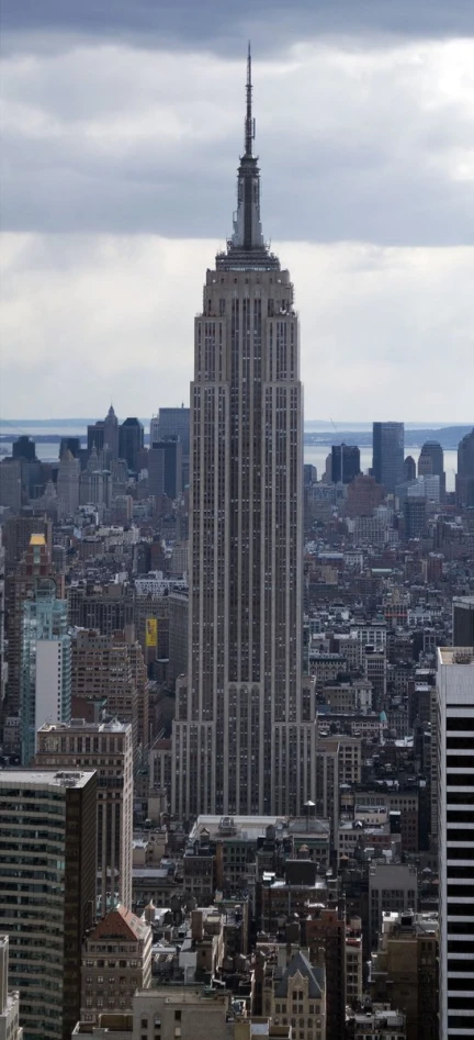 a high rise in a city, with the empire building in the middle