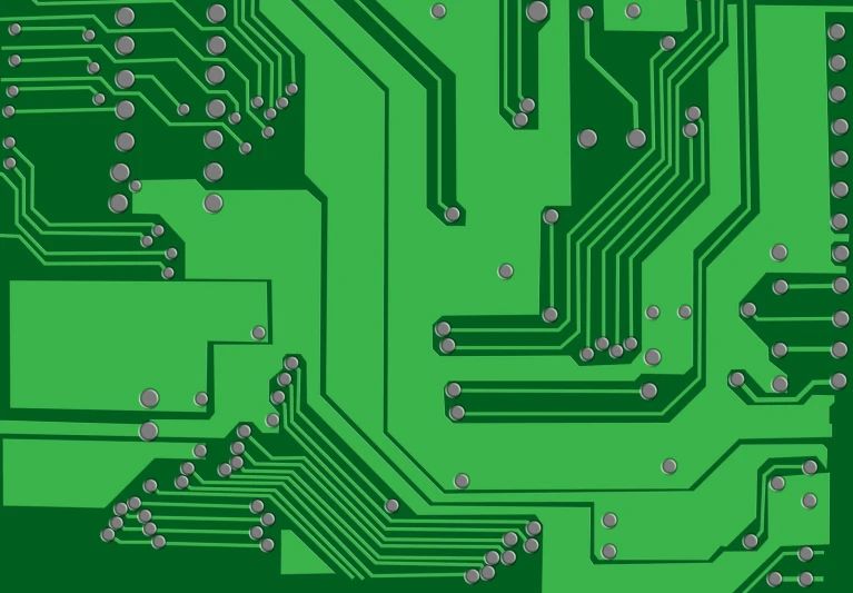 a circuit board with many different screws on it