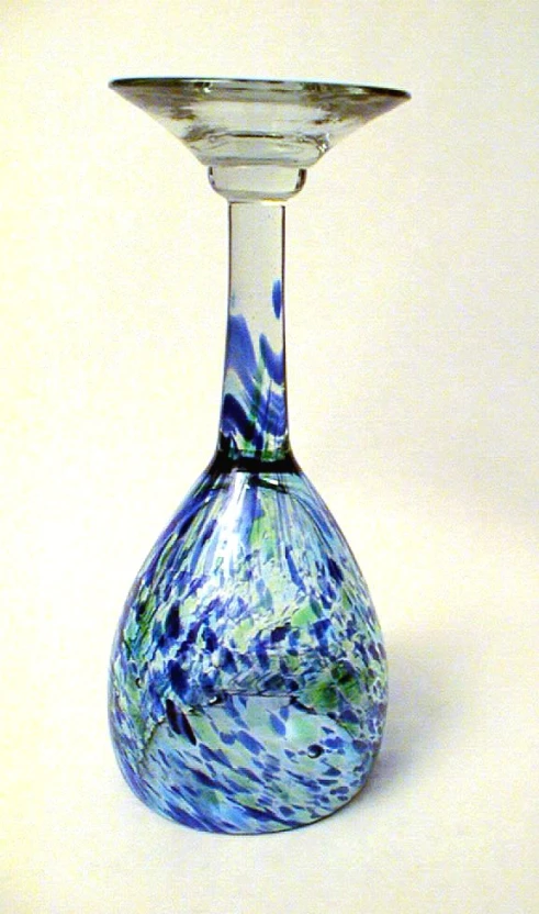 a large glass vase with swirl designs on it