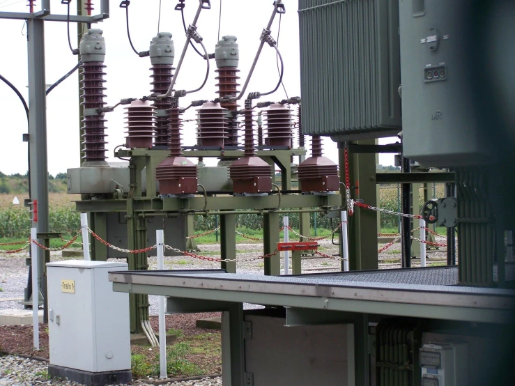 an electrical substation has a variety of wires that are connected to a device