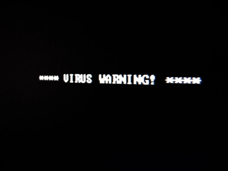 a po of the word uhus warning appears in an image of darkness