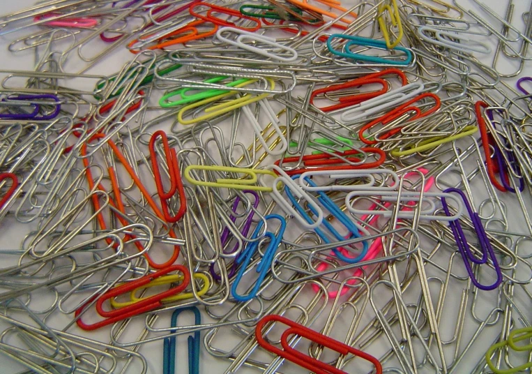 lots of color paper clips all in the same row