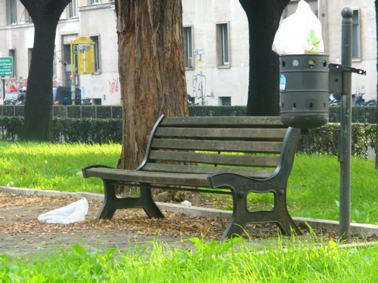 a park bench on the side of a street