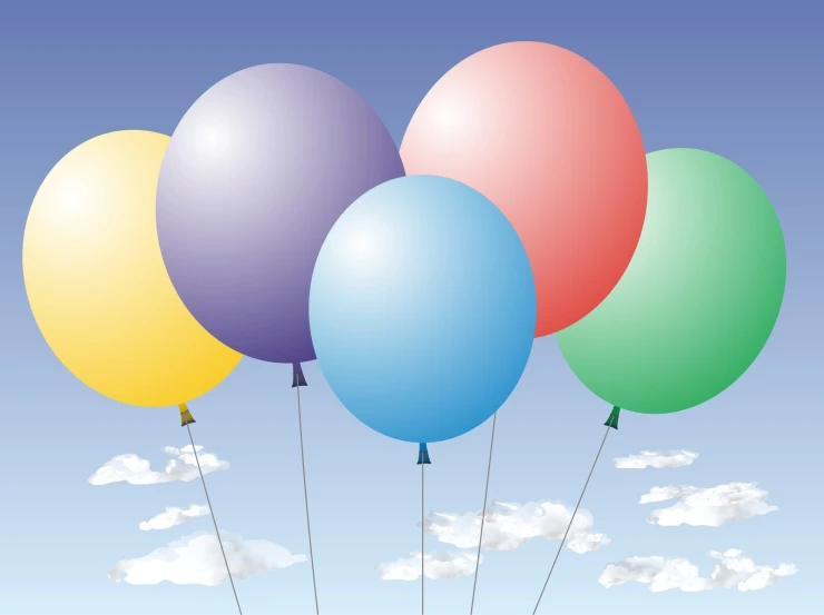 a group of balloons floating in the air