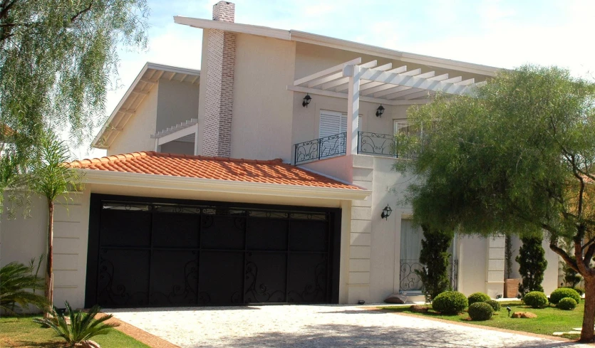 a house with a garage on a side street