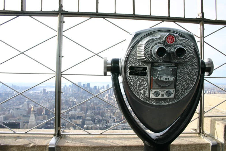 two binoculars at the top of a skyscr