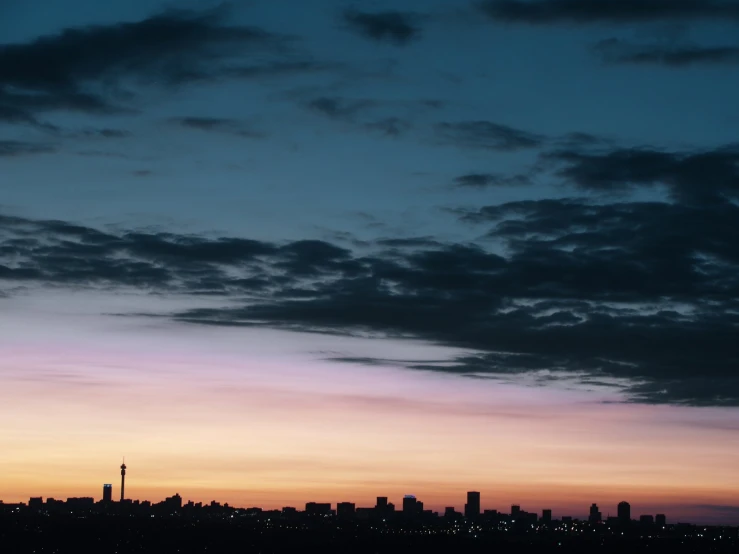 a night view of a city skyline and water