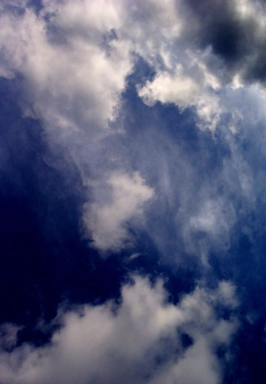 white clouds and blue sky above each other