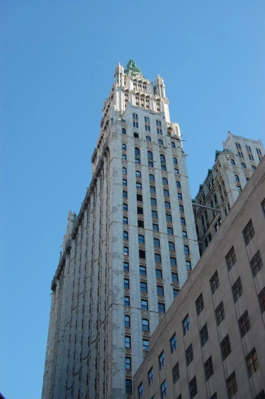 a view looking up at the top of a skyscr