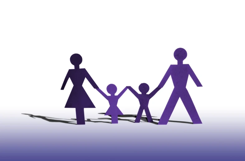 a family of purple paper cutouts in the air
