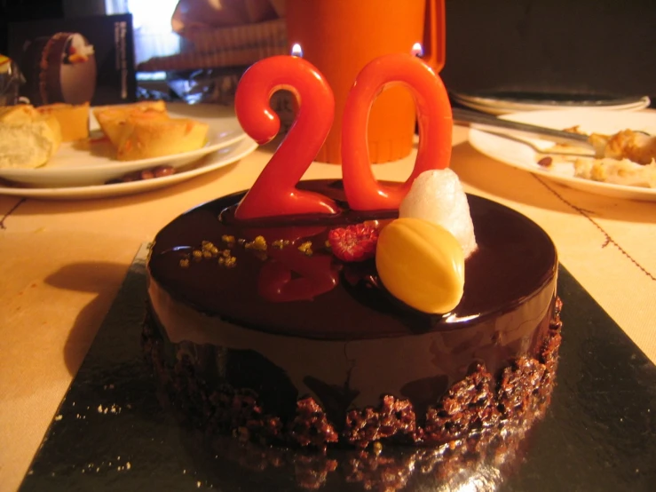 the birthday cake is on a table ready to be eaten