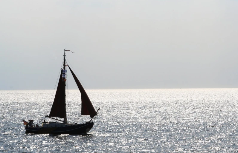 a sailboat that is in the ocean