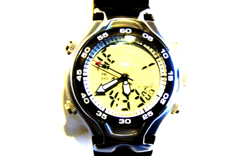 a close up of a black and white watch