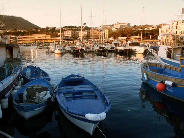 a large harbor with several small boats at anchor