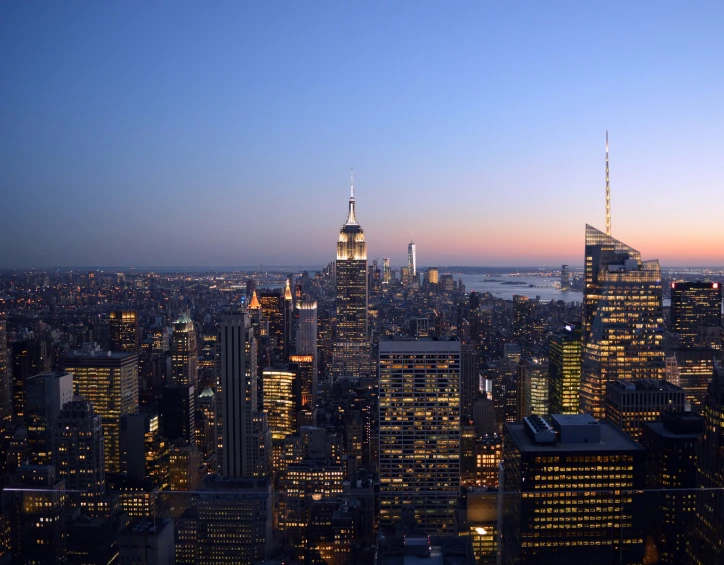 the view of a city at night from above