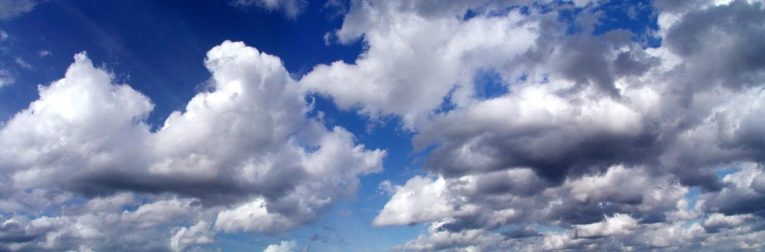 a sky with lots of clouds in the distance